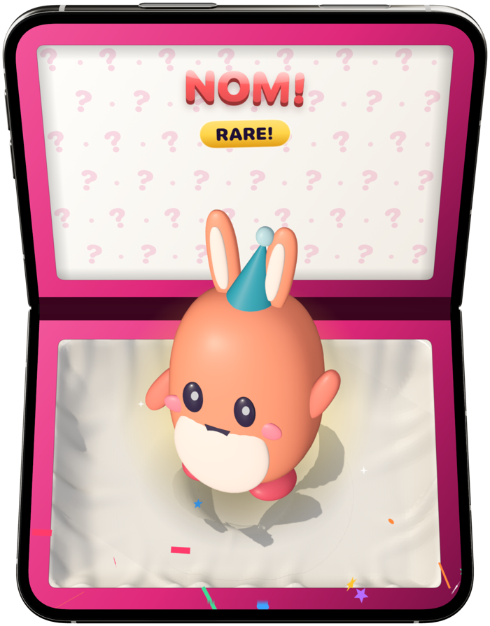A rare bunny in a party hat glowing as it comes out of the box, with NOM! and a RARE! badge in the lid